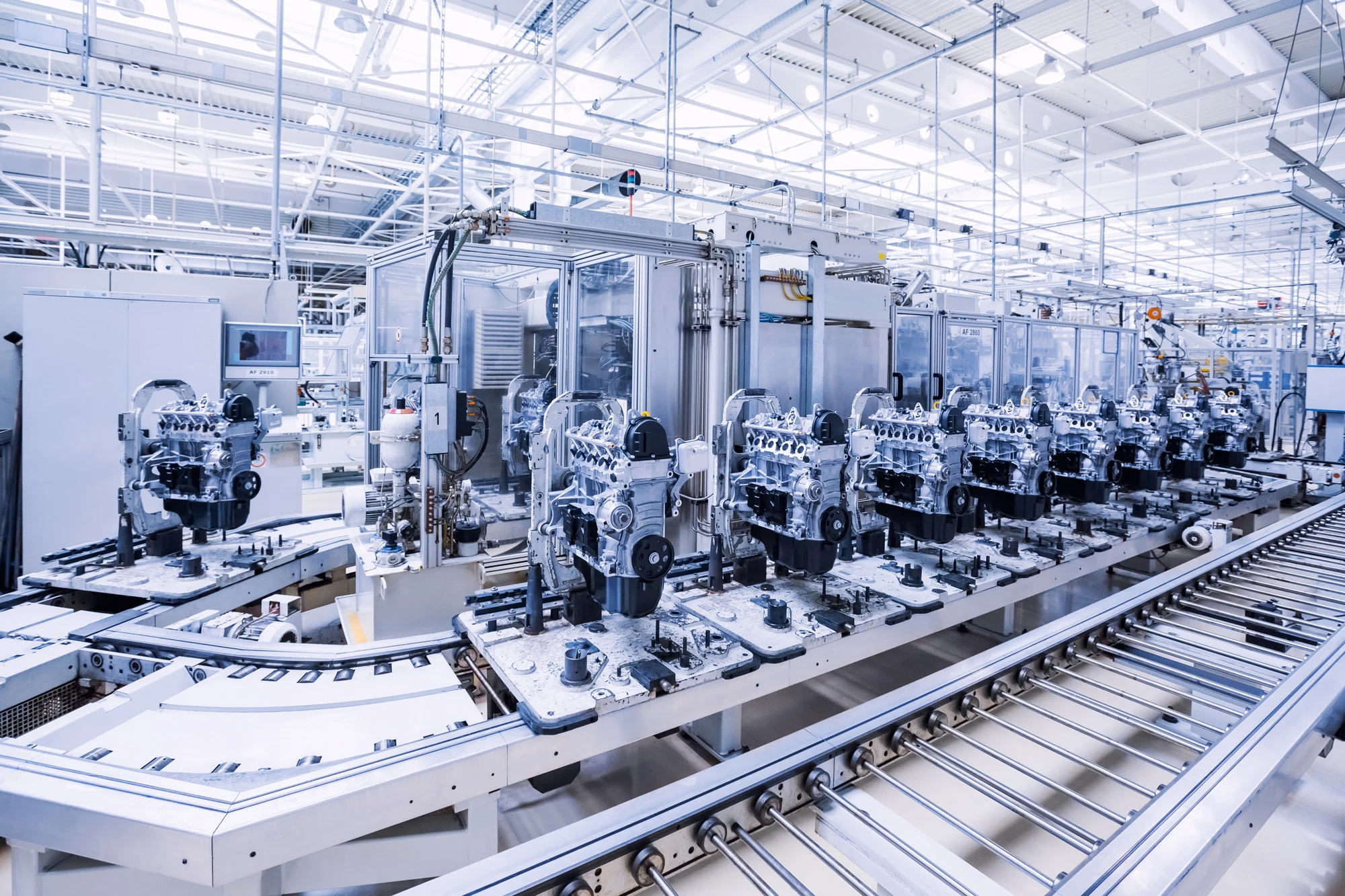 Automated automotive engine manufacturing assembly line operating under Disrupt-X HSEQ industrial safety protocols