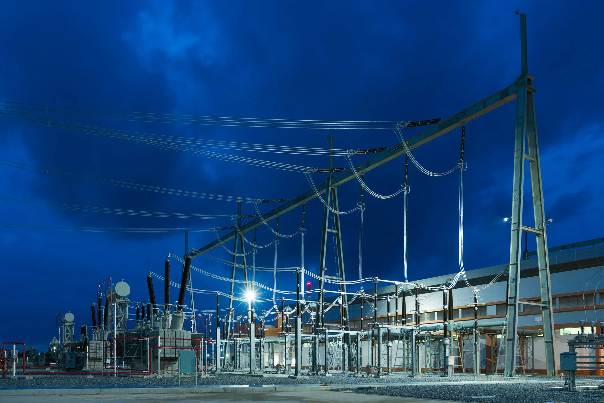 High-voltage electrical transmission substation transformers managed for utility safety under Disrupt-X HSEQ